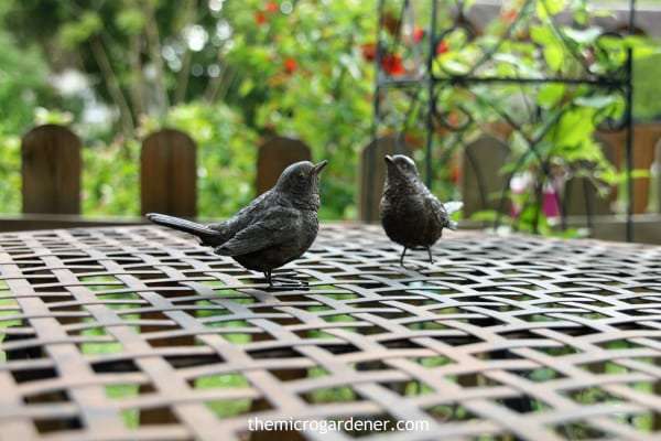 Add a touch of whimsy with something simple like these bird ornaments on an outdoor table