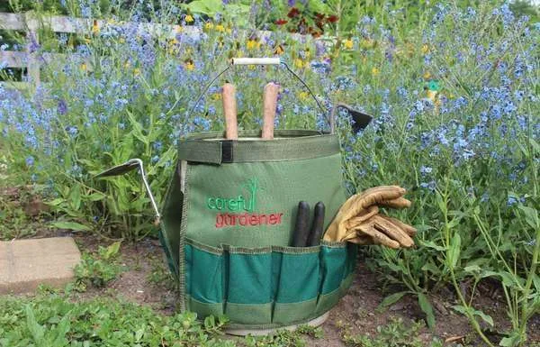 Garden Gift: Bucket caddy - provides storage & makes it easy to carry all your essentials when you’re out in the garden with pockets for mobile phone, tools + drink bottle.